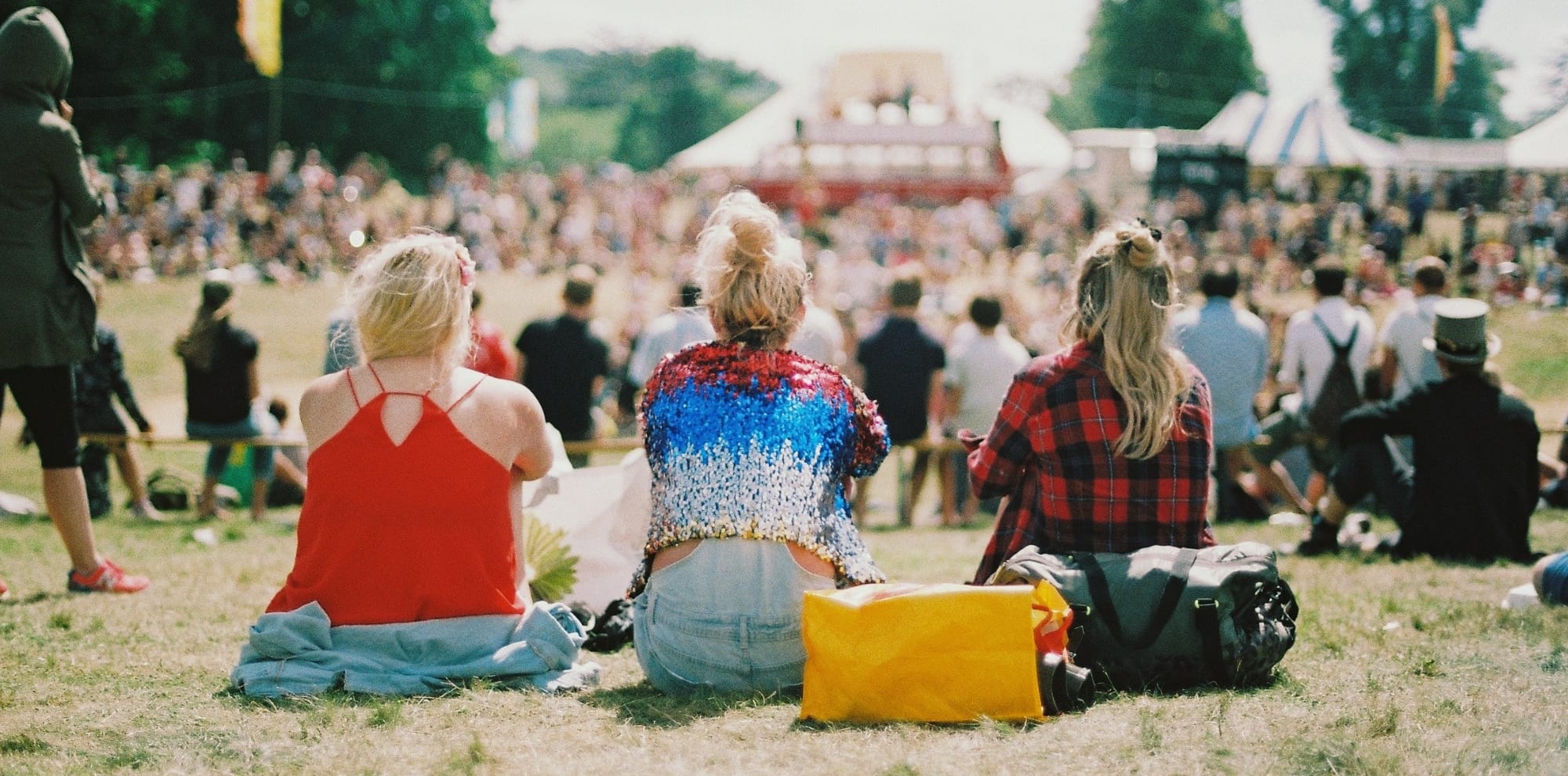 3 girls enjoying a festival